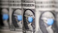 FILE PHOTO: George Washington is seen with printed medical mask on the one Dollar banknotes in this illustration taken, March 31, 2020. REUTERS/Dado Ruvic/Illustration
