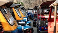 Tuk-tuks that are used to transport tourists around the city are seen idle due to travel bans and border closures from the global coronavirus disease (COVID-19) outbreak in a parking lot in downtown Bangkok, Thailand February 3, 2021. Picture taken Februa