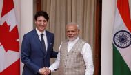 FILE PHOTO: Canadian Prime Minister Justin Trudeau (L) shakes hands with his Indian counterpart Narendra Modi during a photo opportunity ahead of their meeting at Hyderabad House in New Delhi, India, February 23, 2018. REUTERS/Adnan Abidi
