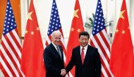 File photo: Chinese President Xi Jinping shakes hands with U.S. Vice President Joe Biden (L) inside the Great Hall of the People in Beijing December 4, 2013. Reuters/Lintao Zhang/Pool//File Photo