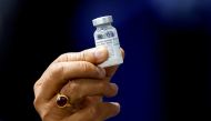 Indian Health Minister Harsh Vardhan holds a dose of Bharat Biotech's COVID-19 vaccine called COVAXIN, during a vaccination campaign at All India Institute of Medical Sciences (AIIMS) hospital in New Delhi, India, January 16, 2021. Reuters/Adnan Abidi/Fil