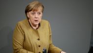 German Chancellor Angela Merkel delivers a speech on the government's response to the coronavirus disease (COVID-19) pandemic, at the country's parliament, the Bundestag, in Berlin, Germany, February 11, 2021. REUTERS/Hannibal Hanschke
