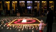 FILE PHOTO: Candles are lit in memory of Hungary's coronavirus disease (COVID-19) victims in Budapest, Hungary, December 21, 2020. REUTERS/Bernadett Szabo/File Photo
