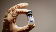 FILE PHOTO: A medical specialist holds a vial of sputnik V vaccine against the coronavirus in a department store in Moscow, Russia, January 18, 2021 REUTERS/Shamil Zhumatov/File Photo
