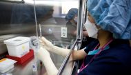 A nurse takes part in the coronavirus disease (COVID-19) vaccination mock drill at the COVID-19 vaccination center in Seoul, South Korea, February 9, 2021. REUTERS/Kim Hong-Ji/Pool/File Photo