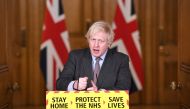 Britain's Prime Minister Boris Johnson addressees the media at a coronavirus disease (COVID-19) pandemic briefing in Downing Street, London, Britain February 3, 2021. Stefan Rousseau/Pool via REUTERS/File Photo