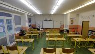 FILE PHOTO: A teacher conducts an online class with pupils receiving distance education inside an empty classroom, as the Czech government shut all schools for two weeks to slow down the spread of the coronavirus disease (COVID-19), at a closed school in 