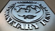 FILE PHOTO: The International Monetary Fund (IMF) logo is seen outside the headquarters building in Washington, U.S., September 4, 2018. REUTERS/Yuri Gripas/File Photo
