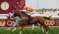 Jockey JP Guillambert guides Aaley A Magam past the finishing line to win the Al Zubara Trophy at Al Rayyan Park yesterday