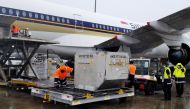New Zealand's first batch of Pfizer-BioNTech coronavirus disease (COVID-19) vaccines is unloaded from a plane after arriving in Auckland, New Zealand, February 15, 2021. Ministry of Health, New Zealand Government/Handout via REUTERS 