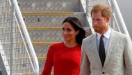 Britain's Prince Harry and Meghan, Duchess of Sussex, arrive at Fua'amotu airport on the main island Tongatapu in Tonga October 25, 2018. REUTERS/Phil Noble/File Photo