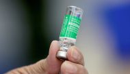 Medical worker prepares a dose of AstraZeneca 