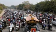 People attend the funeral of Mya Thwate Thwate Khaing, a young woman protester who became the first death among anti-coup demonstrators after she was shot in the head when police tried to disperse a crowd during a protest, in Naypyitaw, Myanmar February 2