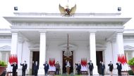 Indonesian President Joko Widodo waves during the announcement of the Indonesia Investment Authority (INA) at the Merdeka Palace in Jakarta, Indonesia, February 16, 2021. Courtesy of Lukas/Indonesian Presidential Palace/Handout via Reuters