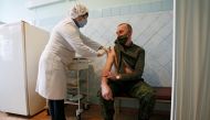 A serviceman receives a dose of Sputnik V (Gam-COVID-Vac) vaccine against the coronavirus disease (COVID-19) at a local hospital in the rebel-controlled city of Donetsk, Ukraine February 24, 2021. REUTERS/Alexander Ermochenko