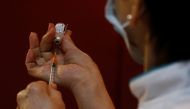 A nurse prepares to vaccinate healthcare workers at Gleneagles hospital, during the coronavirus disease (COVID-19) outbreak, in Singapore January 19, 2021. REUTERS/Edgar Su/File Photo