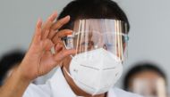 Philippine President Rodrigo Duterte holds a vial of Sinovac’s coronavirus disease (COVID-19) vaccine, the first COVID-19 vaccine to arrive in the country, at Villamor Air Base, Pasay City, Metro Manila, Philippines, February 28, 2021. REUTERS/Eloisa Lope