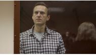 File photo of Kremlin critic Alexei Navalny as he stands inside a defendant dock during a court hearing in Moscow, Russia, Russia February 20, 2021, in this still image taken from video. Press Service of Babushkinsky District Court of Moscow/Handout via R