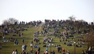 People visit Primrose Hill, amid the coronavirus disease (COVID-19) outbreak, in London, Britain, February 27, 2021. REUTERS/Henry Nicholls