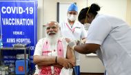 India's Prime Minister Narendra Modi receives a dose of COVAXIN, a coronavirus disease (COVID-19) vaccine developed by India's Bharat Biotech and the state-run Indian Council of Medical Research, at All India Institute of Medical Sciences (AIIMS) hospital