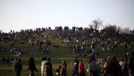 People visit Primrose Hill, amid the coronavirus disease (COVID-19) outbreak, in London, Britain, February 27, 2021. REUTERS/Henry Nicholls
