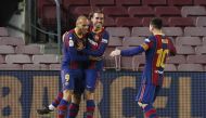 Barcelona's Martin Braithwaite celebrates scoring their third goal with Antoine Griezmann and Lionel Messi REUTERS/Albert Gea