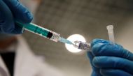 A medical worker holds a syringe with Sputnik V vaccine against the coronavirus disease (COVID-19) at a vaccination centre in Saint Petersburg, Russia February 24, 2021. REUTERS/Anton Vaganov/File Photo