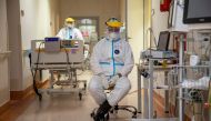 Doctor Lukasz Grabarczyk sits inside the coronavirus disease (COVID-19) ward at the University Clinical Hospital in Olsztyn, Poland, March 2, 2021. Picture taken March 2, 2021. REUTERS/Kuba Stezycki