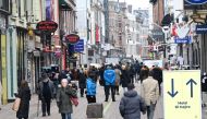 People walk on a street as stores reopen amid the coronavirus disease (COVID-19) pandemic in Copenhagen, Denmark March 1, 2021. Ritzau Scanpix/Philip Davali via Reuters 