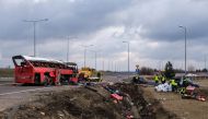 Emergency workers inspect the site of a Ukrainian bus crash on the side of A4 highway from Jaroslaw to Korczowa, near Koszyce, Poland March 6, 2021. Agencja Gazeta/Patryk Ogorzalek via REUTERS 