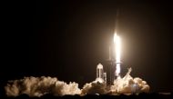 A SpaceX Falcon 9 rocket, with the Crew Dragon capsule, is launched carrying four astronauts on the first operational NASA commercial crew mission at Kennedy Space Center in Cape Canaveral, Florida, U.S. November 15, 2020. REUTERS/Thom Baur
