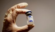 A medical specialist holds a vial of Sputnik V vaccine against the coronavirus in a department store in Moscow, Russia, January 18, 2021. REUTERS/Shamil Zhumatov/File Photo