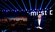 Simon Hu, CEO of Ant Group, is seen on a giant screen as he delivers a speech at the INCLUSION Fintech Conference in Shanghai, China September 24, 2020. REUTERS/Cheng Leng/File Photo