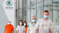 Employees of the Skoda Auto factory wait in a line to get tested for the coronavirus disease (COVID-19) in Mlada Boleslav, Czech Republic, March 12, 2021. REUTERS/David W Cerny