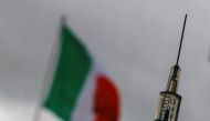 FILE PHOTO: A syringe with a dose of the AstraZeneca vaccine against the coronavirus disease (COVID-19) is seen in a vaccination centre at the Cecchignola military compound, in Rome, Italy, March 9, 2021. REUTERS/Guglielmo Mangiapane/File Photo
