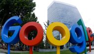 FILE PHOTO: The brand logo of Alphabet Inc's Google is seen outside its office in Beijing, China August 8, 2018. Picture taken with a fisheye lens. REUTERS/Thomas Peter/File Photo
