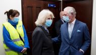 Britain's Prince Charles, Camilla, Duchess of Cornwall, visit a pop-up COVID-19 vaccination centre at the Finsbury Park Mosque, amid the coronavirus disease (COVID-19) pandemic, in London, Britain March 16, 2021. Geoff Pugh/Pool via REUTERS
