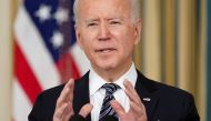 FILE PHOTO: U.S. President Joe Biden speaks about the implementation of the American Rescue Plan in the State Dining Room at the White House in Washington, U.S., March 15, 2021. REUTERS/Kevin Lamarque/File Photo
