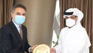 The President of Qatar Football Association, Sheikh Hamad bin Khalifa bin Ahmed Al Thani, presenting a memento to Ambassador of the Kingdom of Morocco to Qatar, H E Mohamed Setri.