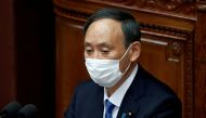 Japanese Prime Minister Yoshihide Suga delivers a policy speech at the opening of the Lower House parliamentary session in Tokyo, Japan January 18, 2021. REUTERS/Issei Kato/File Photo