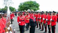 Tanzania's new President Samia Suluhu Hassan inspects a guard of honour mounted by the Tanzania Peoples Defense Forces after she was sworn into office following the death of her predecessor John Pombe Magufuli at State House in Dar es Salaam, Tanzania Mar