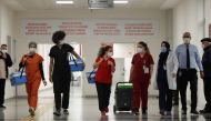 FILE PHOTO: Health workers carry Sinovac's CoronaVac COVID-19 vaccine boxes at Sancaktepe Sehit Dr. Ilhan Varank Training and Research... MURAD SEZER January 14, 2021 05:35am EST
