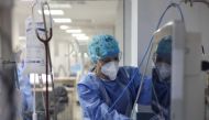 FILE PHOTO: Intensivist Iliana Ioannidou is reflected on a monitor at the intensive care unit (ICU) of the Sotiria hospital, amid the coronavirus disease (COVID-19) pandemic, in Athens, Greece, February 28, 2021. REUTERS/Giorgos Moutafis/File Photo
