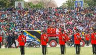 Military officers escort a gun carriage carrying the coffin of late Tanzanian President John Magufuli draped in the national flag, during the State Funeral Procession at the Jamhuri Stadium in Dodoma, Tanzania March 22, 2021. Presidential Press Service/Ha