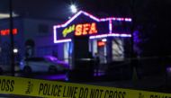 FILE PHOTO: Crime scene tape surrounds Gold spa after deadly shootings at a businesses in the Atlanta area, in Atlanta, Georgia, U.S. March 16, 2021. REUTERS/Chris Aluka Berry/File Photo
