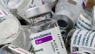 FILE PHOTO: Empty vials of Oxford/AstraZeneca's COVID-19 vaccine are pictured amid a vaccination campaign in Bierset, Belgium March 17, 2021. REUTERS/Yves Herman/File Photo
