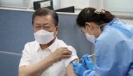 South Korean President Moon Jae-in receives a coronavirus disease (COVID-19) vaccine in Seoul, South Korea, March 23, 2021. Yonhap via REUTERS