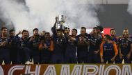 Cricket - Fifth Twenty20 International - India v England - Narendra Modi Stadium, Ahmedabad, India - March 20, 2021 India celebrate winning the series with the trophy REUTERS/Danish Siddiqui
