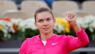 FILE PHOTO: Tennis - French Open - Roland Garros, Paris, France - September 30, 2020 Romania's Simona Halep celebrates winning her second round match against Romania's Irina-Camelia Begu REUTERS/Charles Platiau/File Photo
