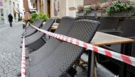 Tables and chairs are seen next to a closed restaurant as the coronavirus disease (COVID-19) lockdown continues in Vienna, Austria March 22, 2021. REUTERS/Leonhard Foeger